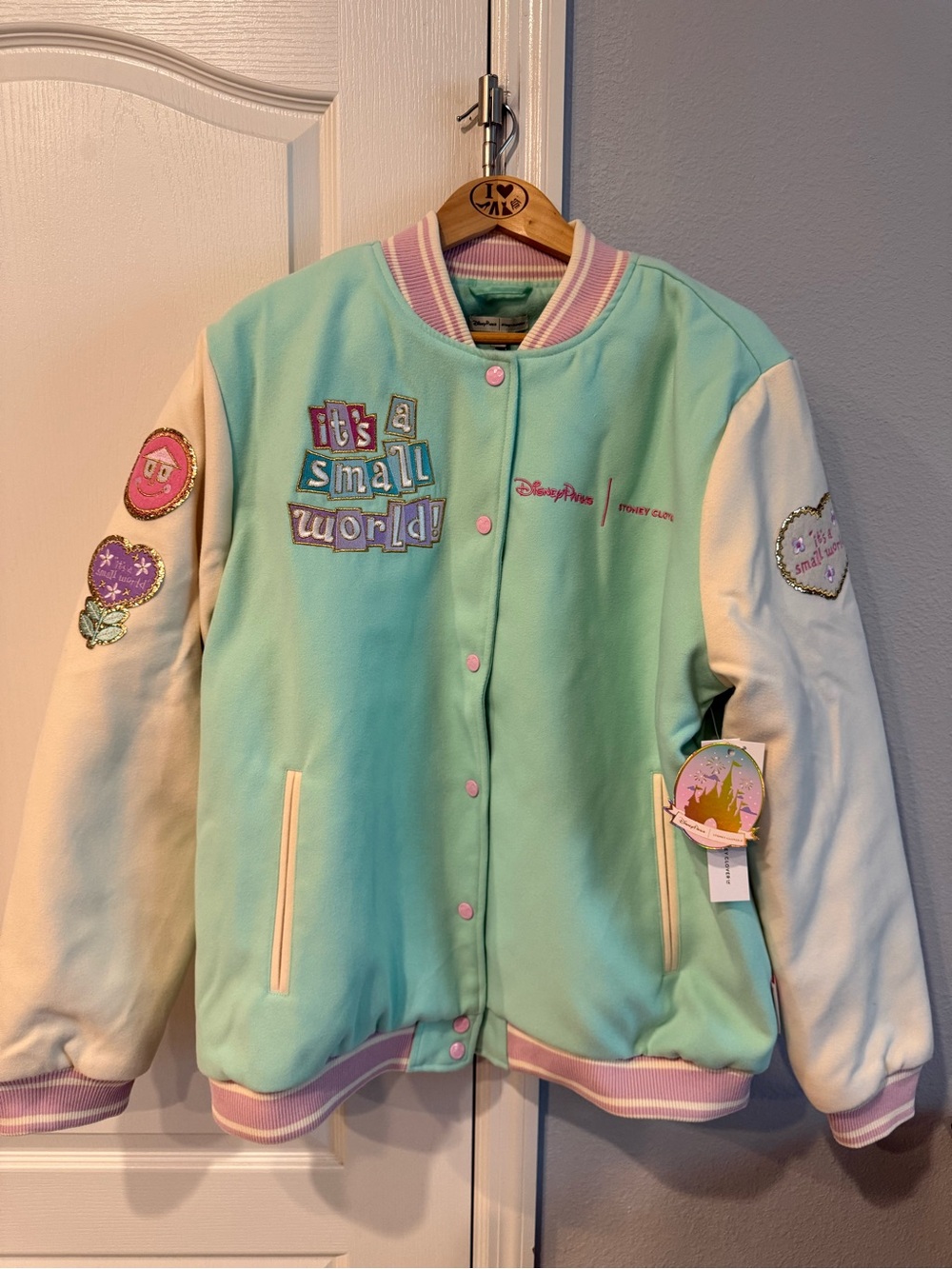 Disney Mint, Cream & Pink 'It's a Small World' Varsity Jacket